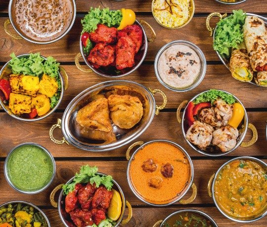 Platter of curries, rices and sides available from Taste of India, best takeaway and delivery in Sheerness